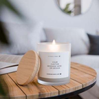 Personalised scented soy candle in white glass jar with bamboo lid and custom label