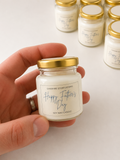 Personalised 50ml mini soy wax candles in clear glass jars with gold lids and custom labels for weddings and celebrations