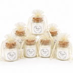 Mini soy wax candle favours arranged for a party