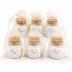 Mini candle party favours in organza bags